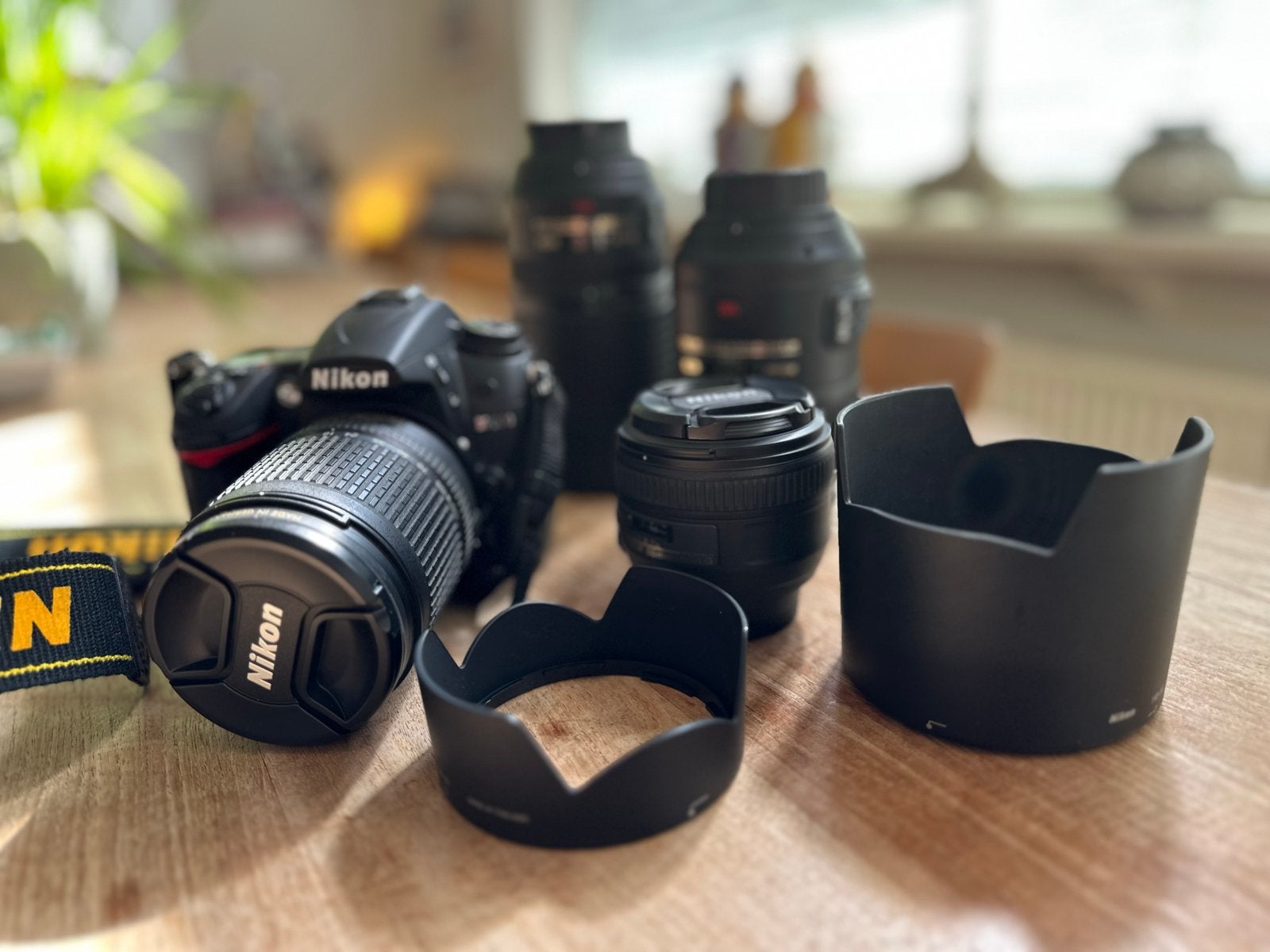 Nikon D7000 Spiegelreflexcamera met 4 lenzen, Spiegelreflex, Zo goed als nieuw, Nikon, Draagriem