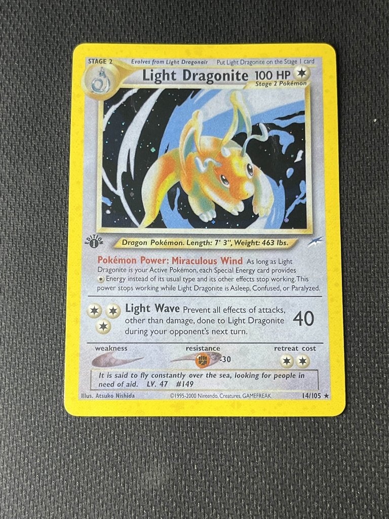 1st Edition Light Dragonite (NDE 14), Ophalen of Verzenden, Zo goed als nieuw, Losse kaart, Foil