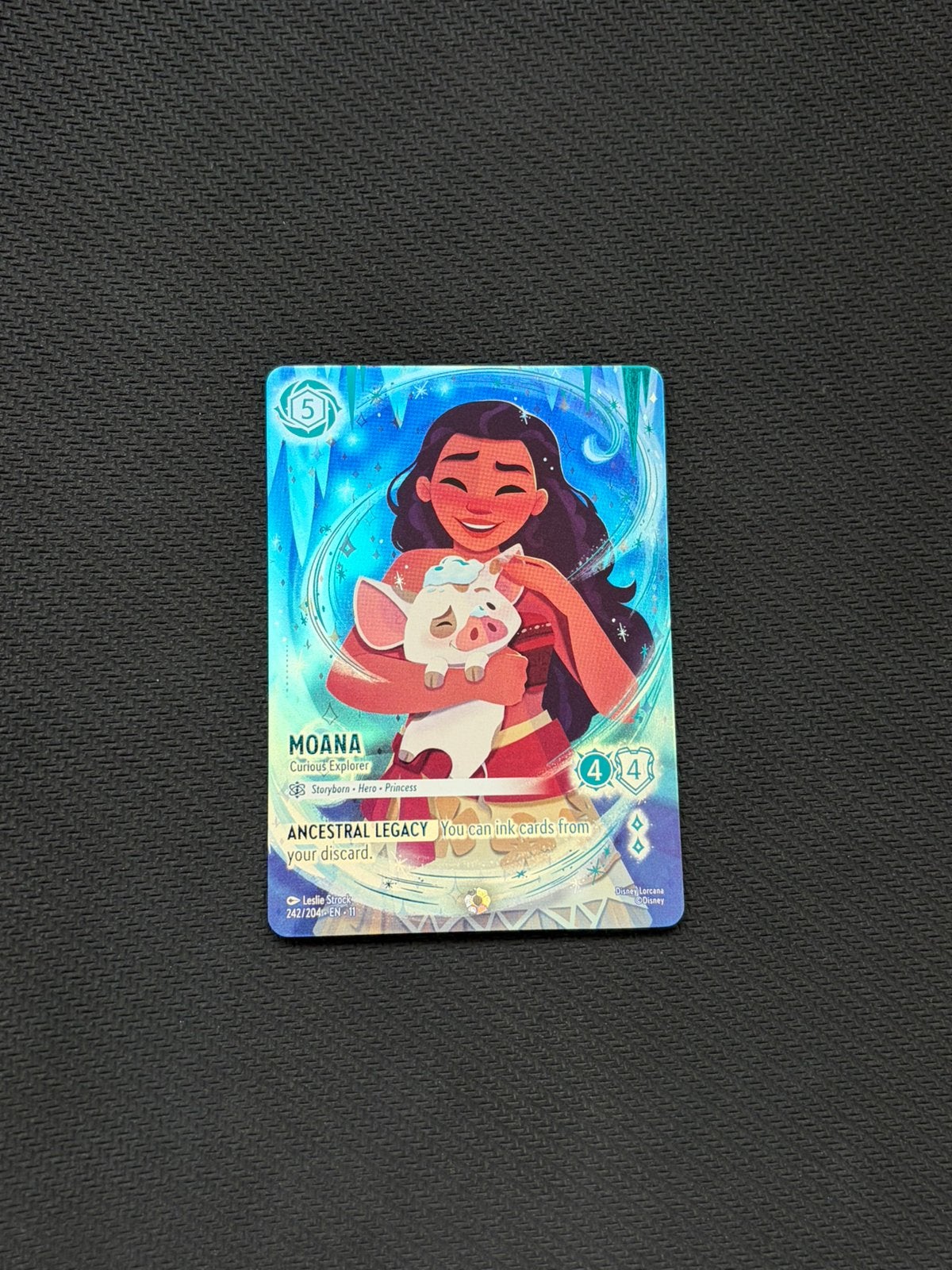 Disney Lorcana – Moana, Curious Explorer (Enchanted Foil), Hobby en Vrije tijd, Verzamelkaartspellen | Overige, Ophalen of Verzenden