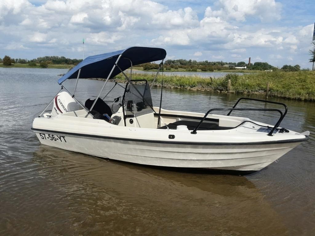 Consoleboot Theri met 60pk Envinrude Etec, Watersport en Boten, Speedboten, Ophalen, Kunststof, Gebruikt, Minder dan 70 pk