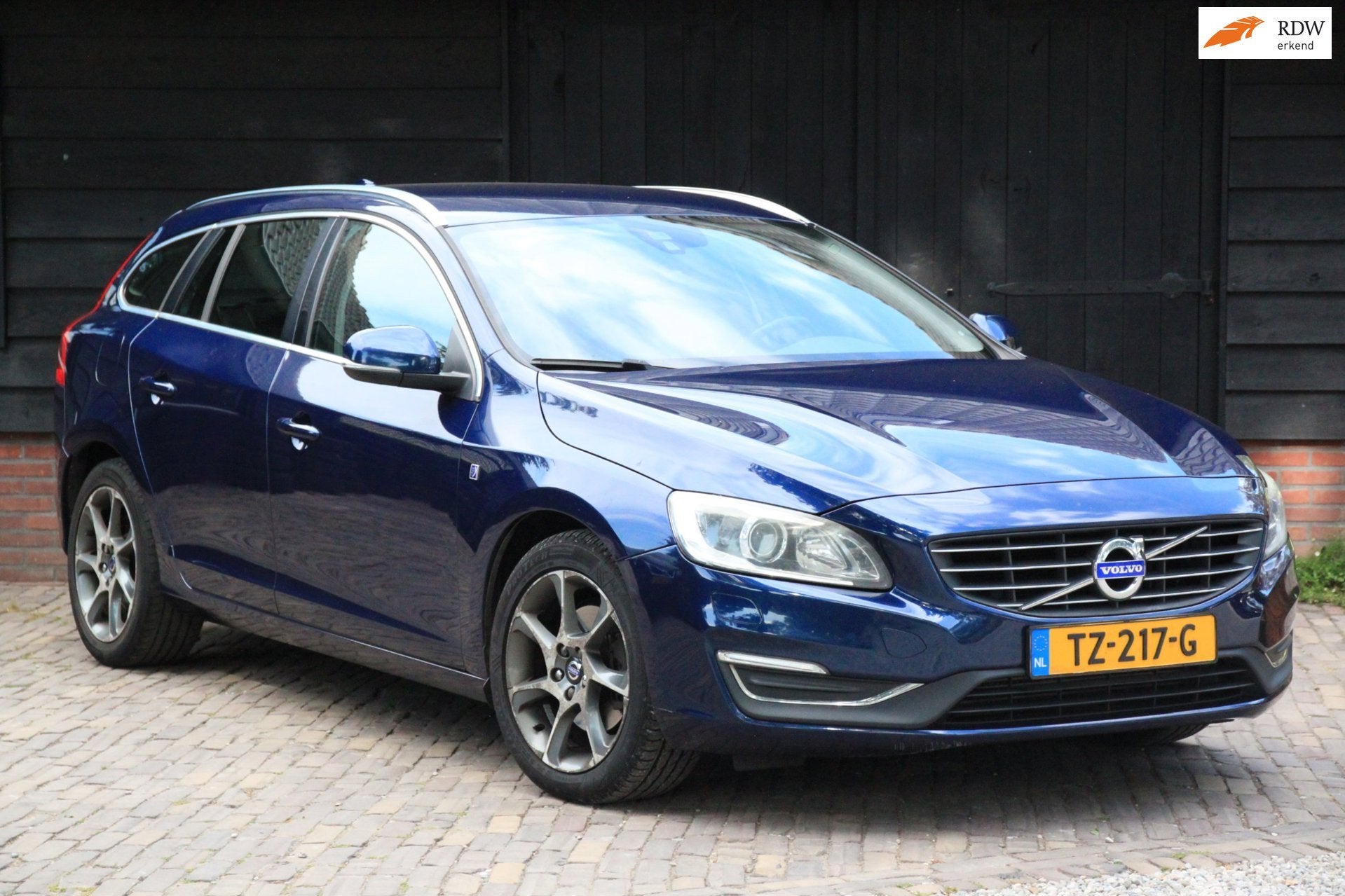 Volvo V60 2.0 D4 Ocean Race Leer/Navigatie/Parkeersensor/Sto, Auto's, Volvo, Voorwielaandrijving, 1969 cc, Blauw, Leder
