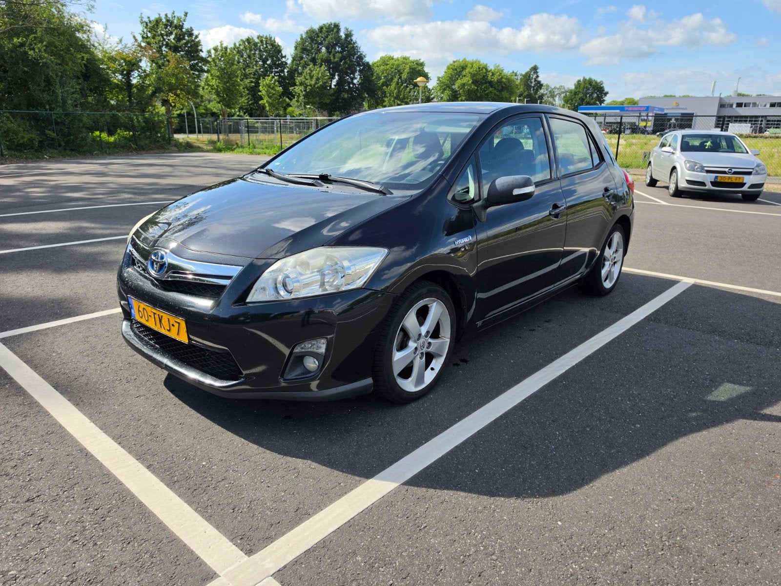 Toyota Auris 1.8 Full Hybrid 136PK 5D CVT 2012 Zwart, Auto's, Toyota, Euro 5, Stof, Zwart, 4 cilinders