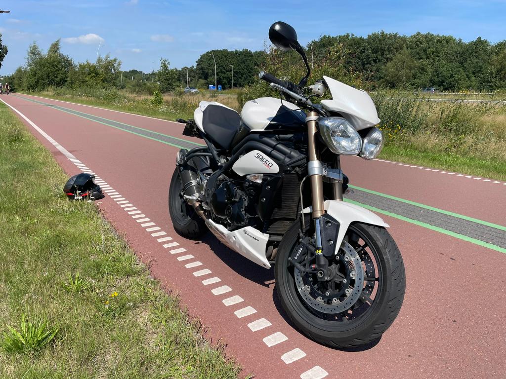 Triumph Speed Triple 1050 ABS (2014), Occasion, Motorrijbewijs A, Sportuitlaat, 3 cilinders