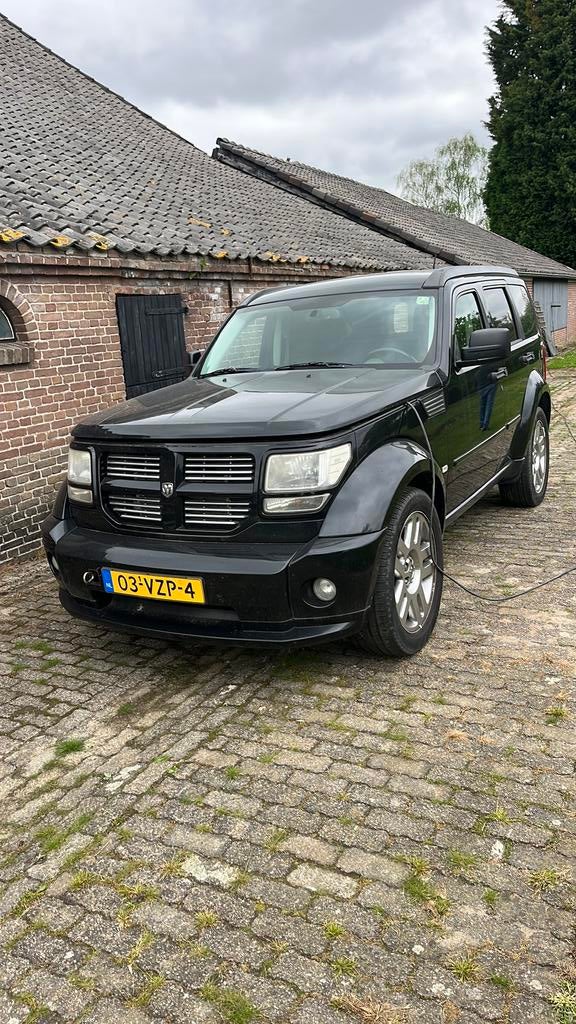 Dodge Nitro 2.8 CRD L4 AWD LR AUT 2009, Auto's, Automaat, 4 cilinders, Zwart, Origineel Nederlands