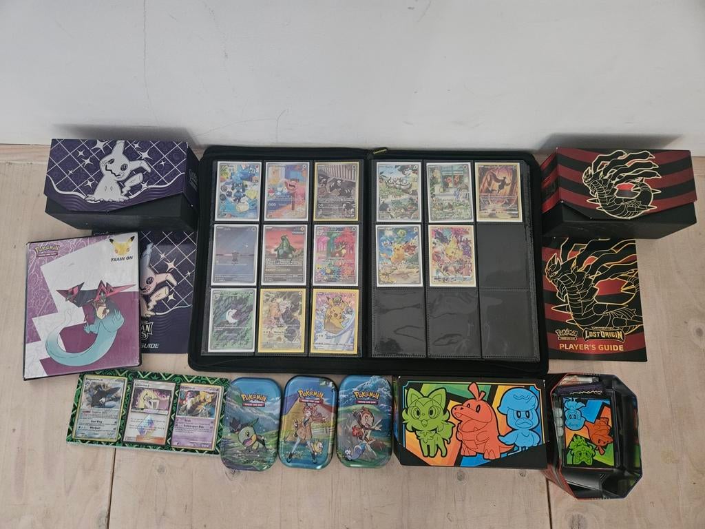 map met zeldzame pokemon kaarten+ 3 elite trainer box, Ophalen, Zo goed als nieuw, Meerdere kaarten, Foil