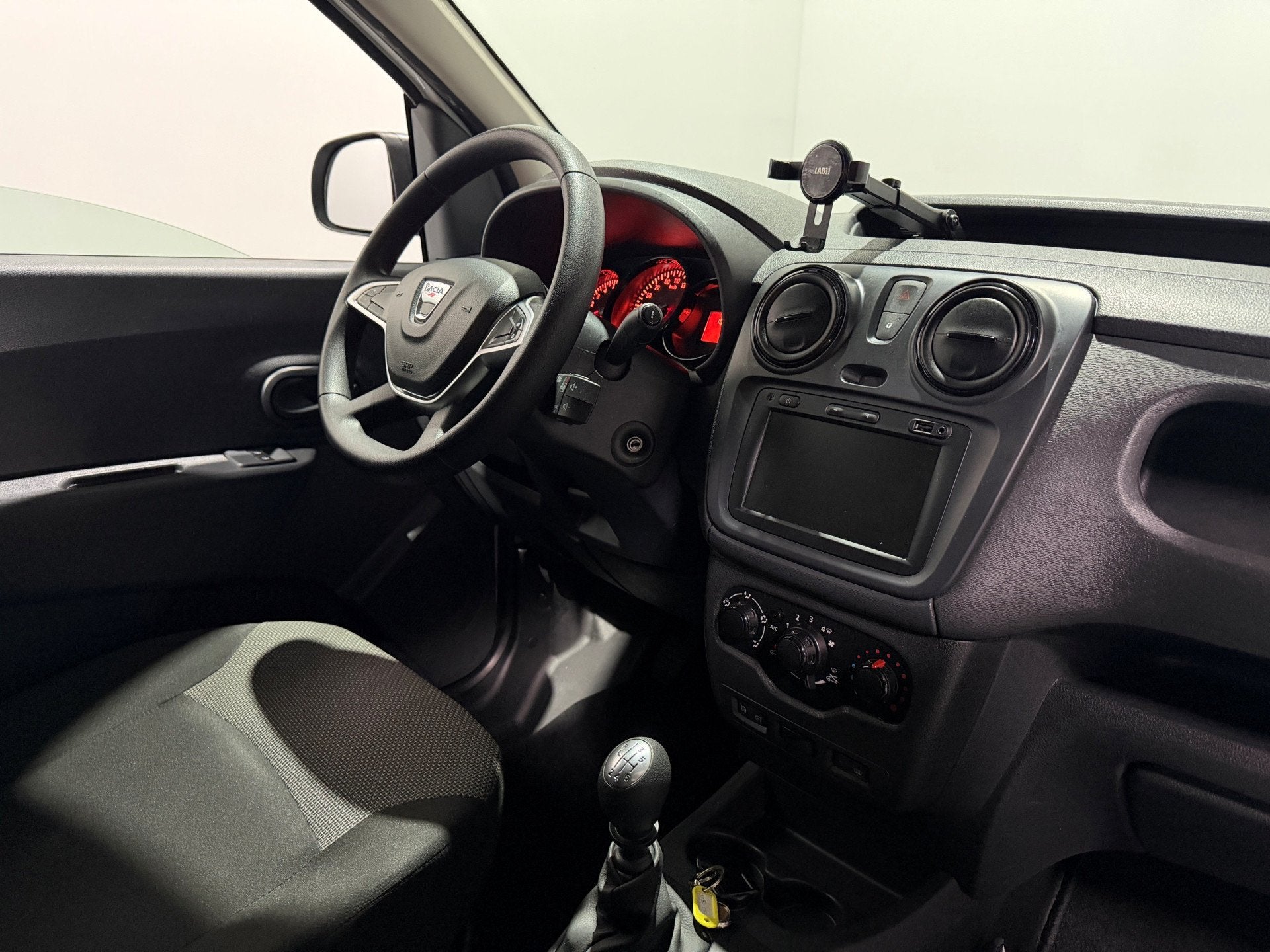 Dacia Dokker 1.5 Blue dCi 90 Solid - Bluetooth / Navi / Crui, Auto's, Bestelauto's, Gebruikt, Euro 6, 4 cilinders, Wit