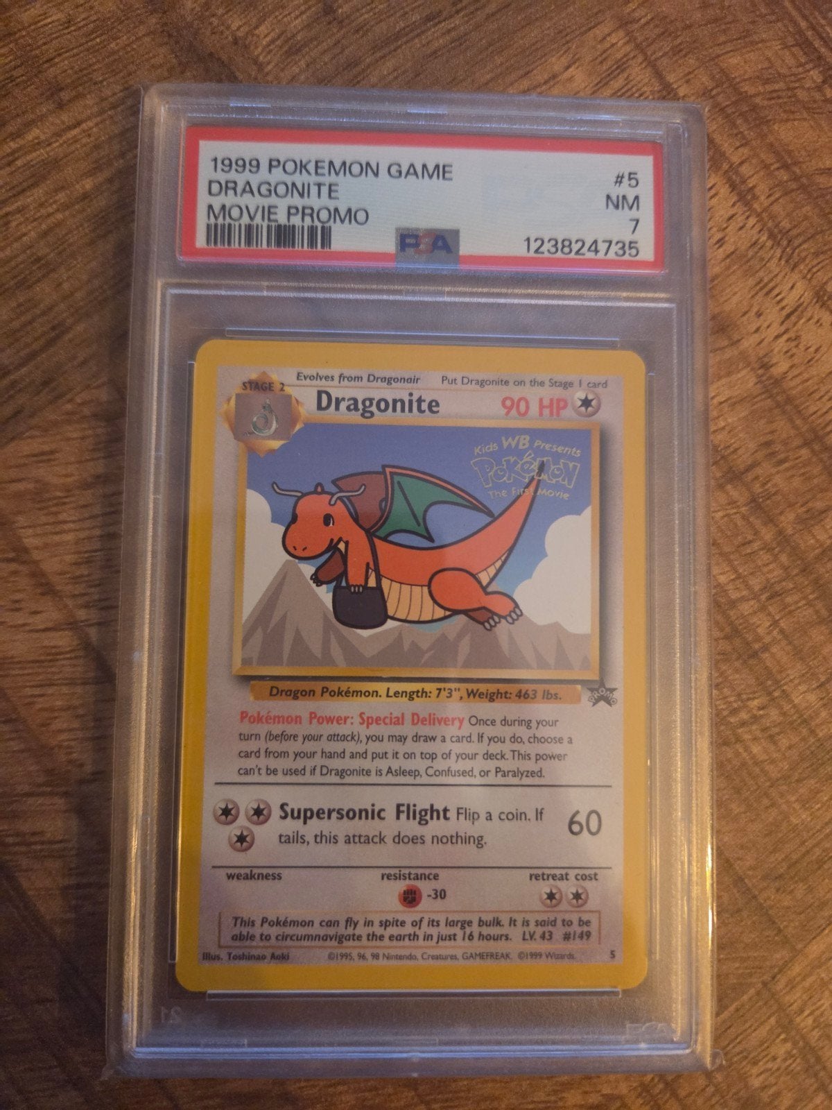Dragonite #5 1999 Movie Promo PSA 7 Pokémon Kaart, Ophalen of Verzenden, Zo goed als nieuw, Losse kaart