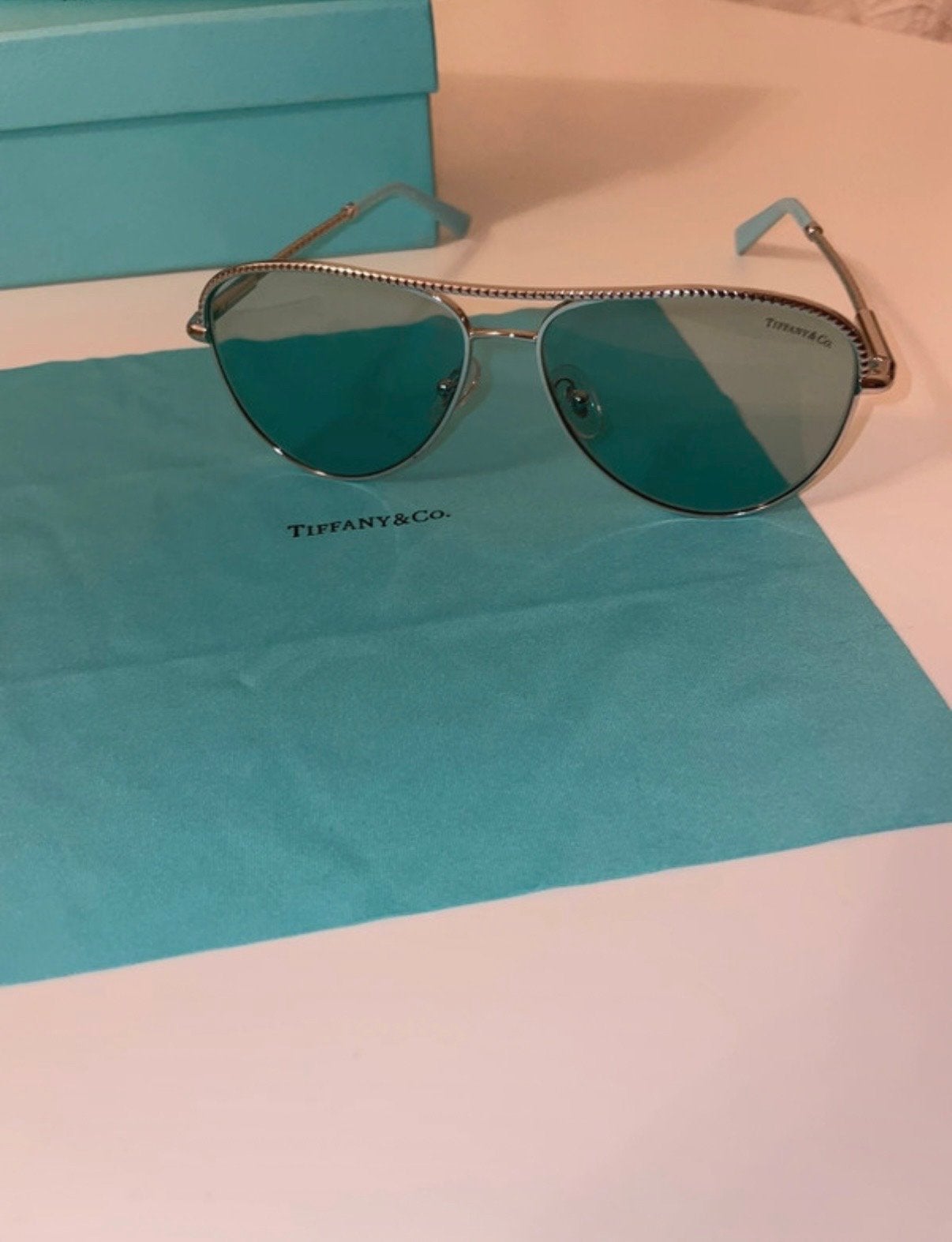 Tiffany & Co. Zonnebril met turquoise details, Overige merken, Zonnebril, Overige kleuren, Ophalen of Verzenden