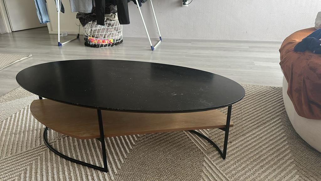 Zwarte ovale salontafel met houten onderblad, Ophalen, Gebruikt, 100 tot 150 cm, 50 tot 100 cm