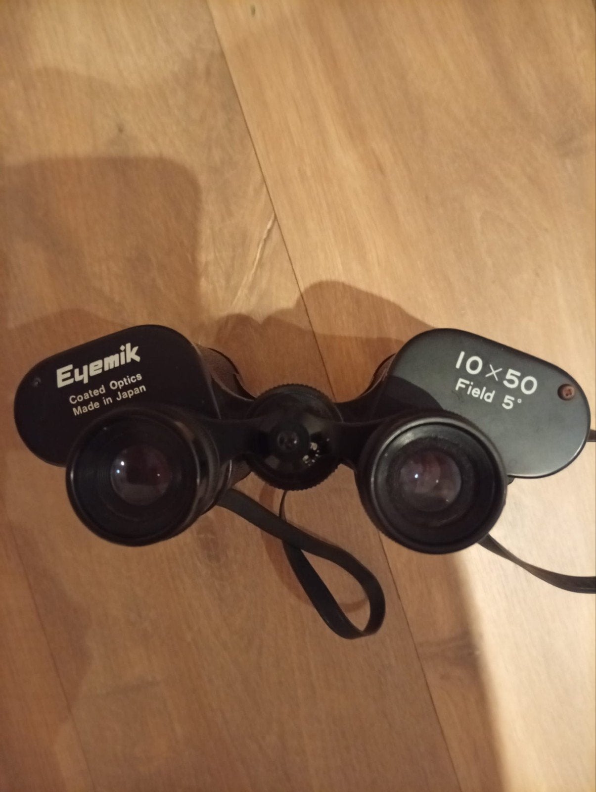 Eyemik verrekijker 10x50, Ophalen