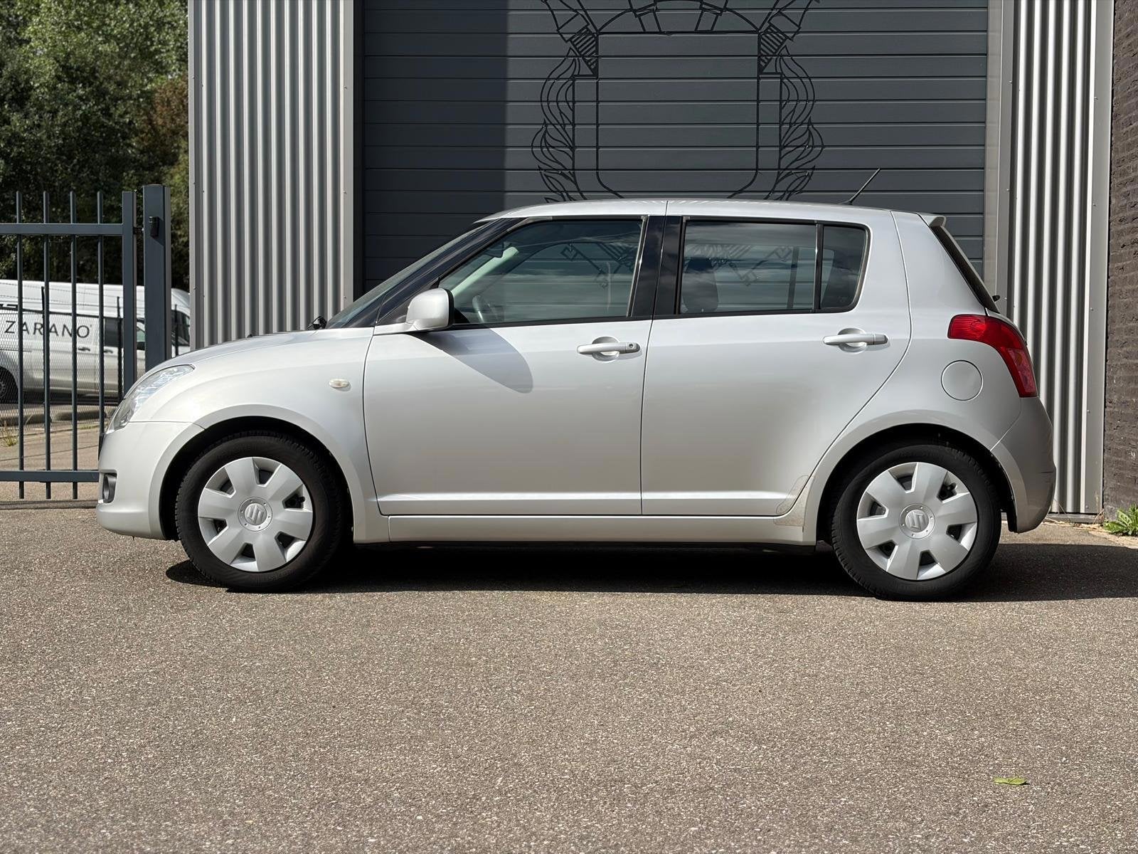 Suzuki Swift 1.3 Shogun Airco|Nap, Voorwielaandrijving, Stof, 400 kg, Swift