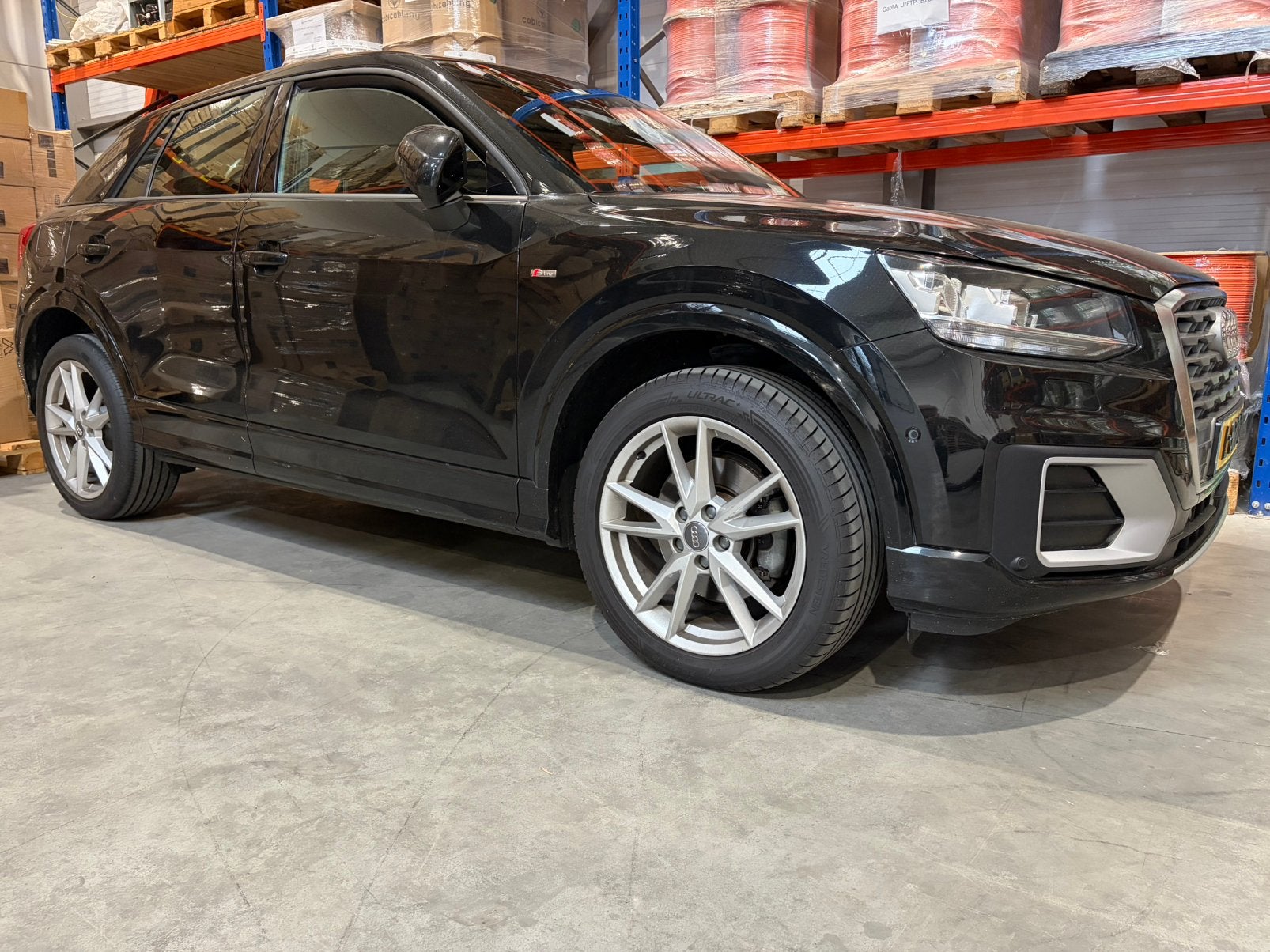 Audi Q2 1.4 Tfsi-150pk STronic 2018 Sport & S-Line zwart, Auto's, 4 cilinders, Verwarmde buitenspiegels, Zwart, Leder