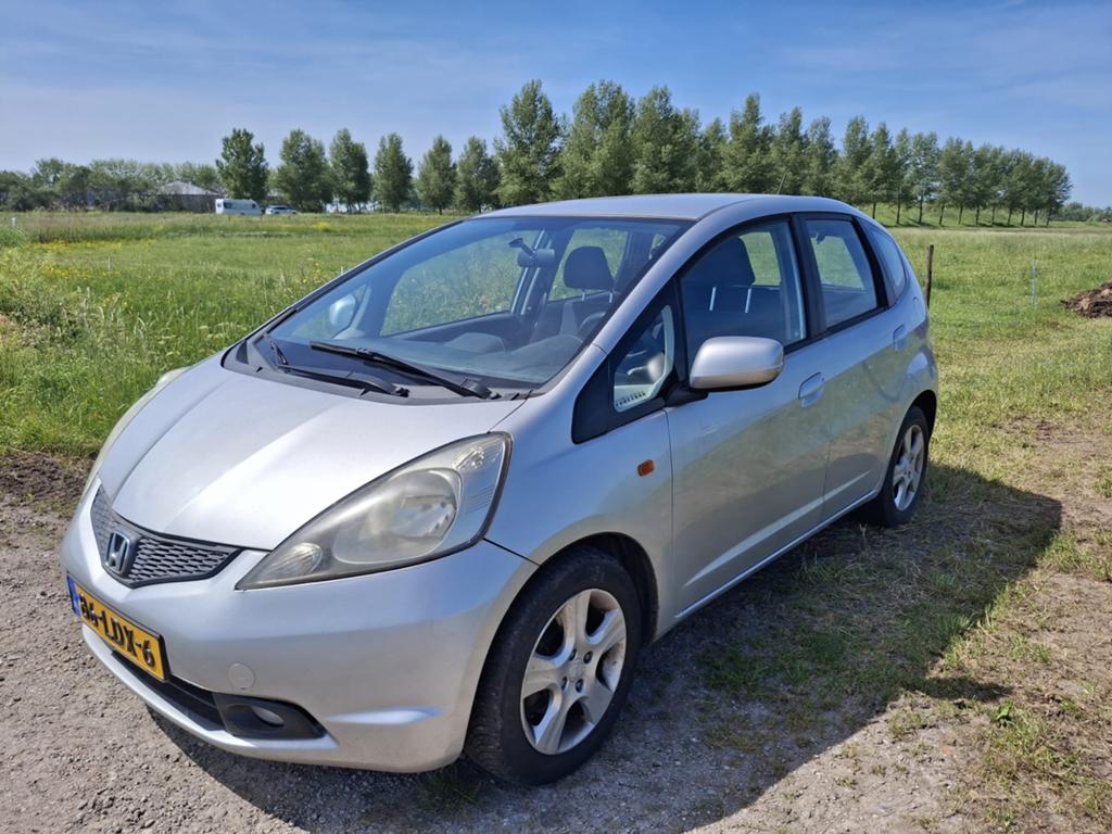 Honda Jazz 1.2 2010 Grijs, Auto's, Voorwielaandrijving, Elektrische ramen, 450 kg, 40 €/maand