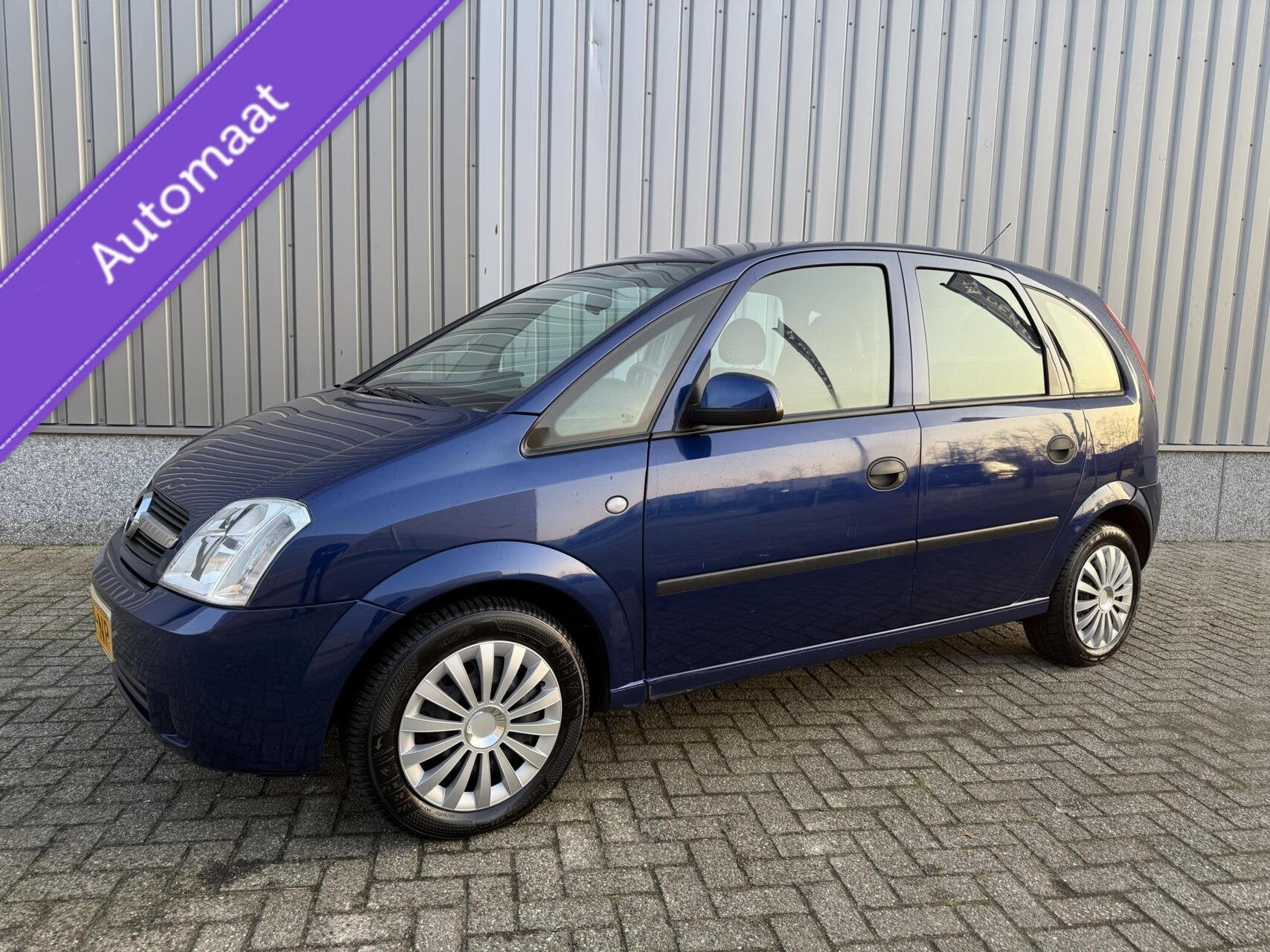 Opel Meriva 1.6-16V Cosmo Automaat, Auto's, Opel, 101 pk, Gebruikt, 4 cilinders, Blauw