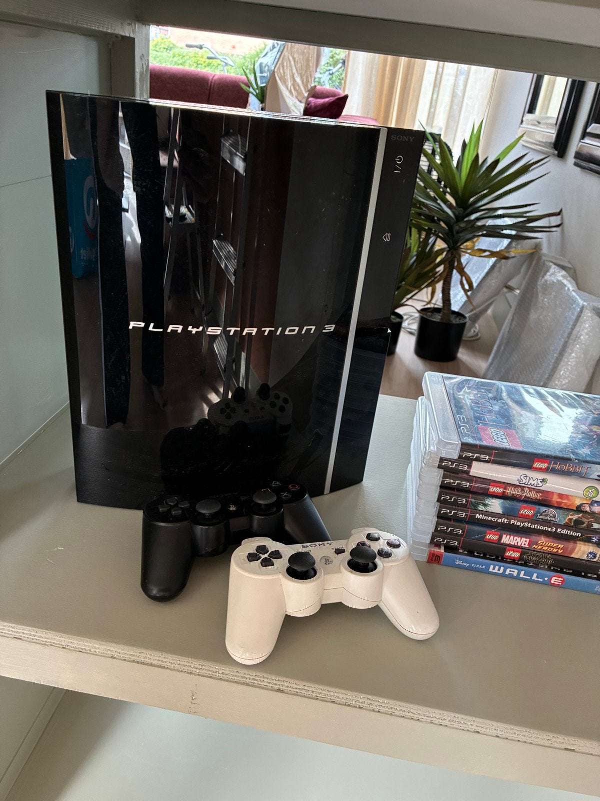 PlayStation 3 disc met 2 controllers en 8 games, Phat, Met 2 controllers, Ophalen of Verzenden, Gebruikt