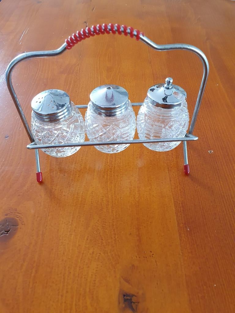Glazen strooierset in metalen houder, Ophalen