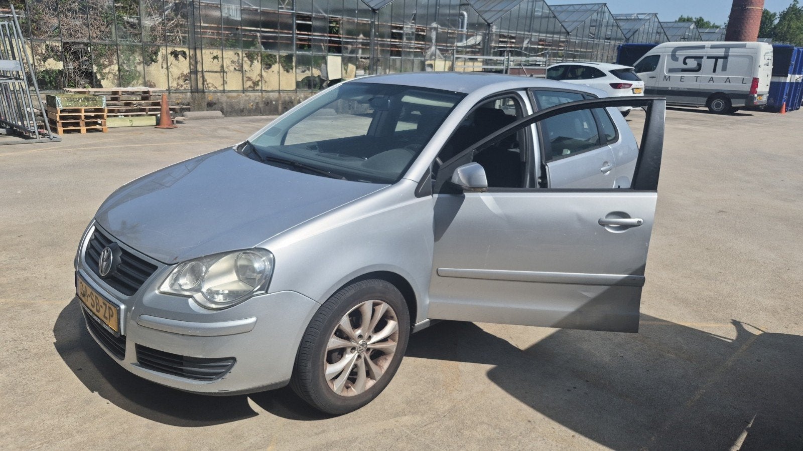Volkswagen Polo 1.4 55KW 2005 Grijs, Auto's, Voorwielaandrijving, 15 km/l, Origineel Nederlands, Handgeschakeld