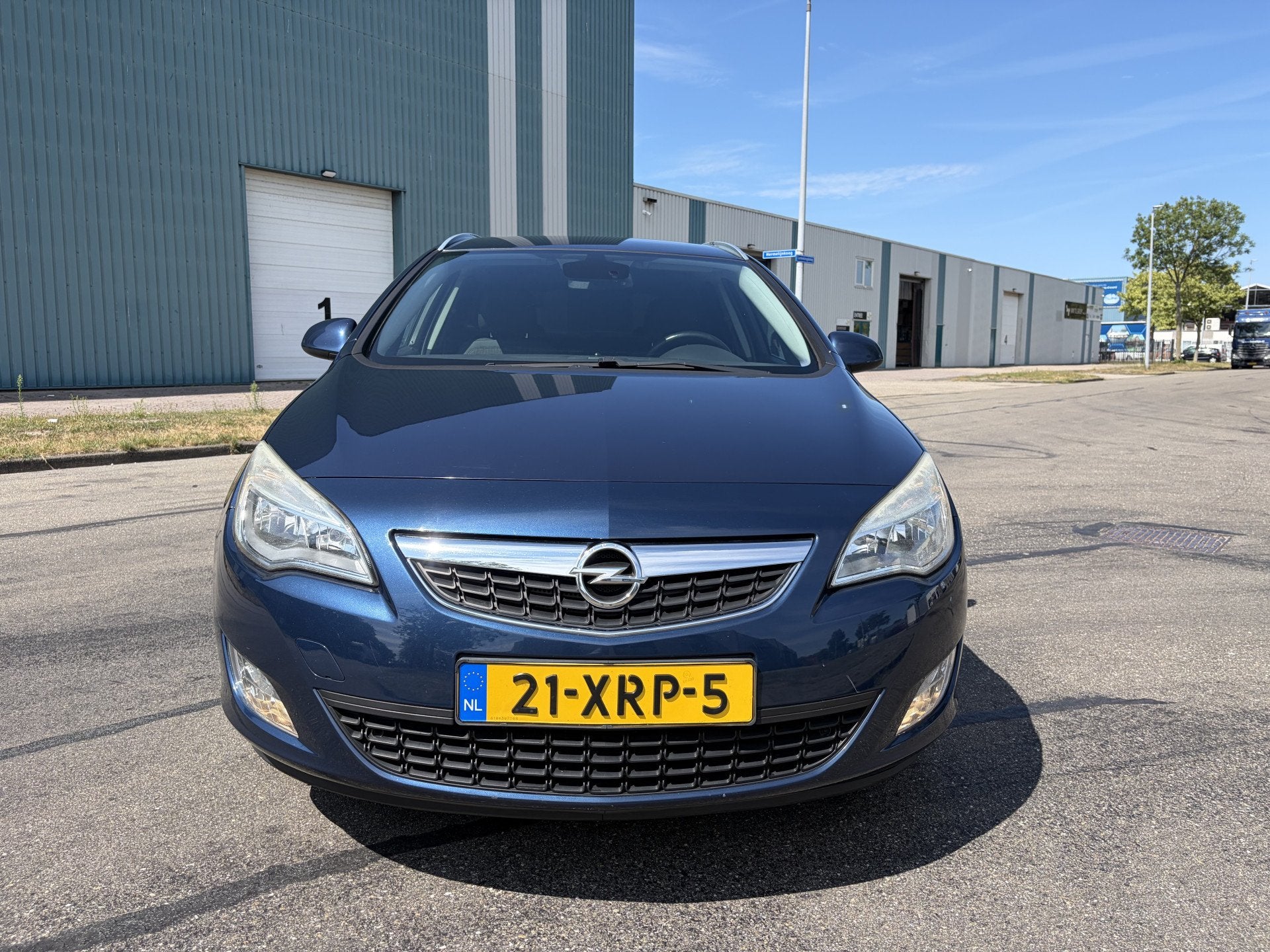 Opel Astra Sports Tourer 1.4i Turbo Cosmo 6-Bak 120 PK. Mooi, Auto's, Voorwielaandrijving, Euro 5, Gebruikt, Zwart