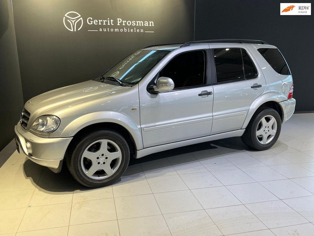 Mercedes-Benz M-klasse 55 AMG (Let op! BTW verrekenbaar), Auto's, Mercedes-Benz, Automaat, Gebruikt, 347 pk, Leder