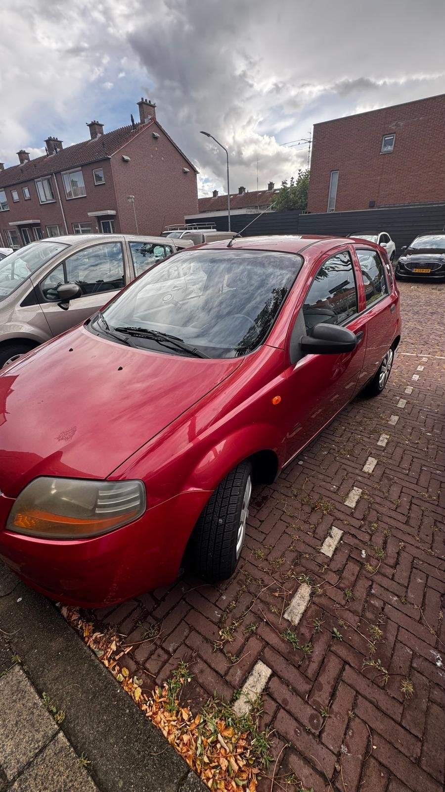 Daewoo Kalos 1.4 16V AUTOMATIC 2003 Rood 185.000 km., Auto's, 40 €/maand, 4 cilinders, 93 pk, Particulier