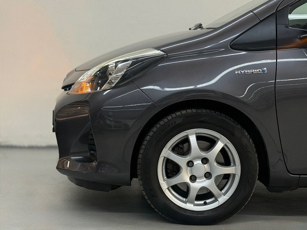Toyota Yaris 1.5 Full Hybrid Aspiration NL Auto Dealeronderh, Auto's, Toyota, Euro 5, Gebruikt, Zwart, 49 €/maand