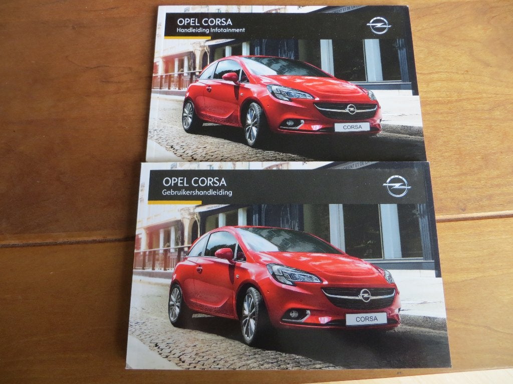 Instructieboek Opel Corsa E 2014-2019 + boek audio/navigatie, Auto diversen, Ophalen of Verzenden