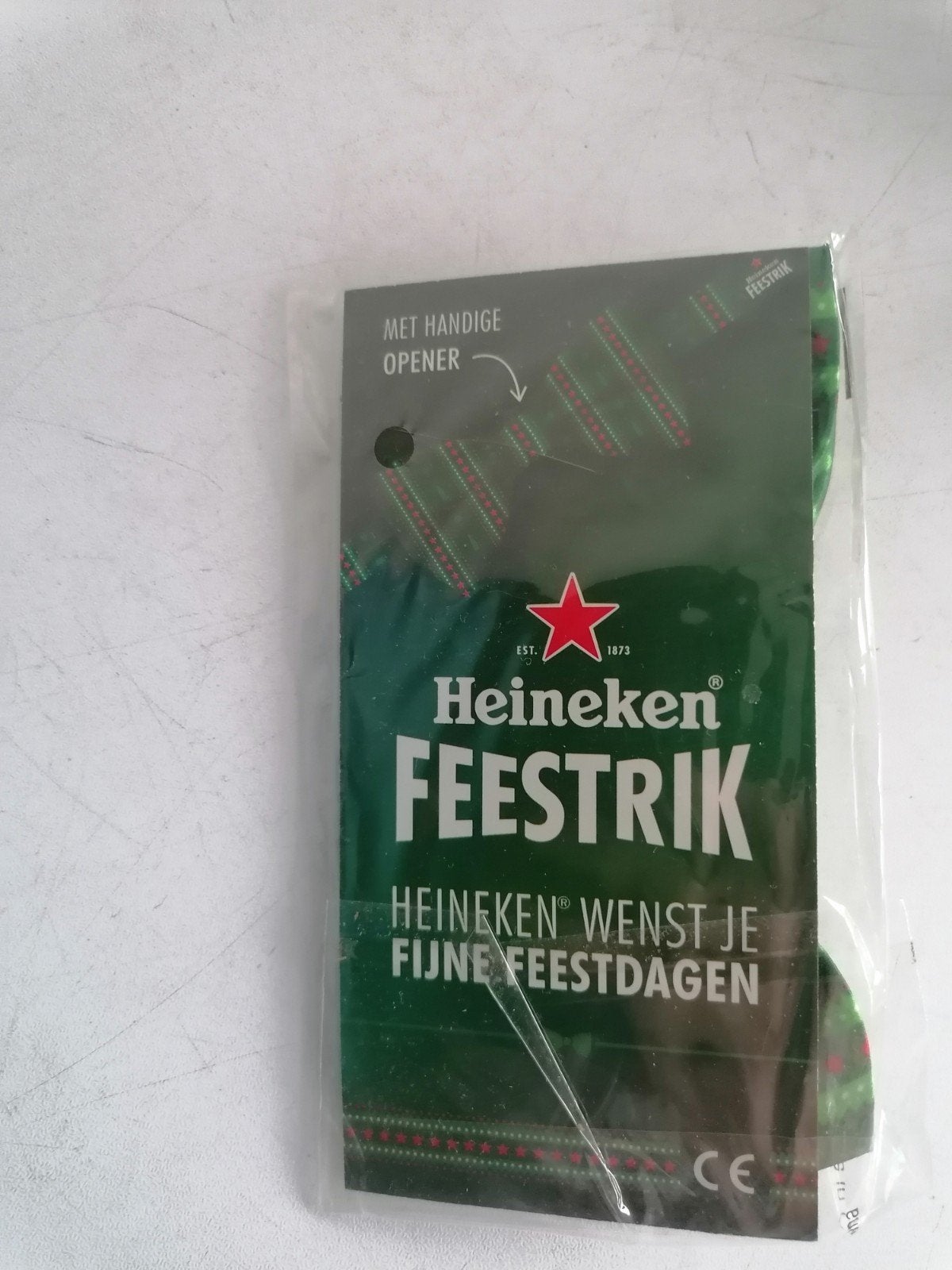 Heineken Feeststrik met opener, Ophalen of Verzenden, Nieuw, Feestartikel, Kerst of Sinterklaas