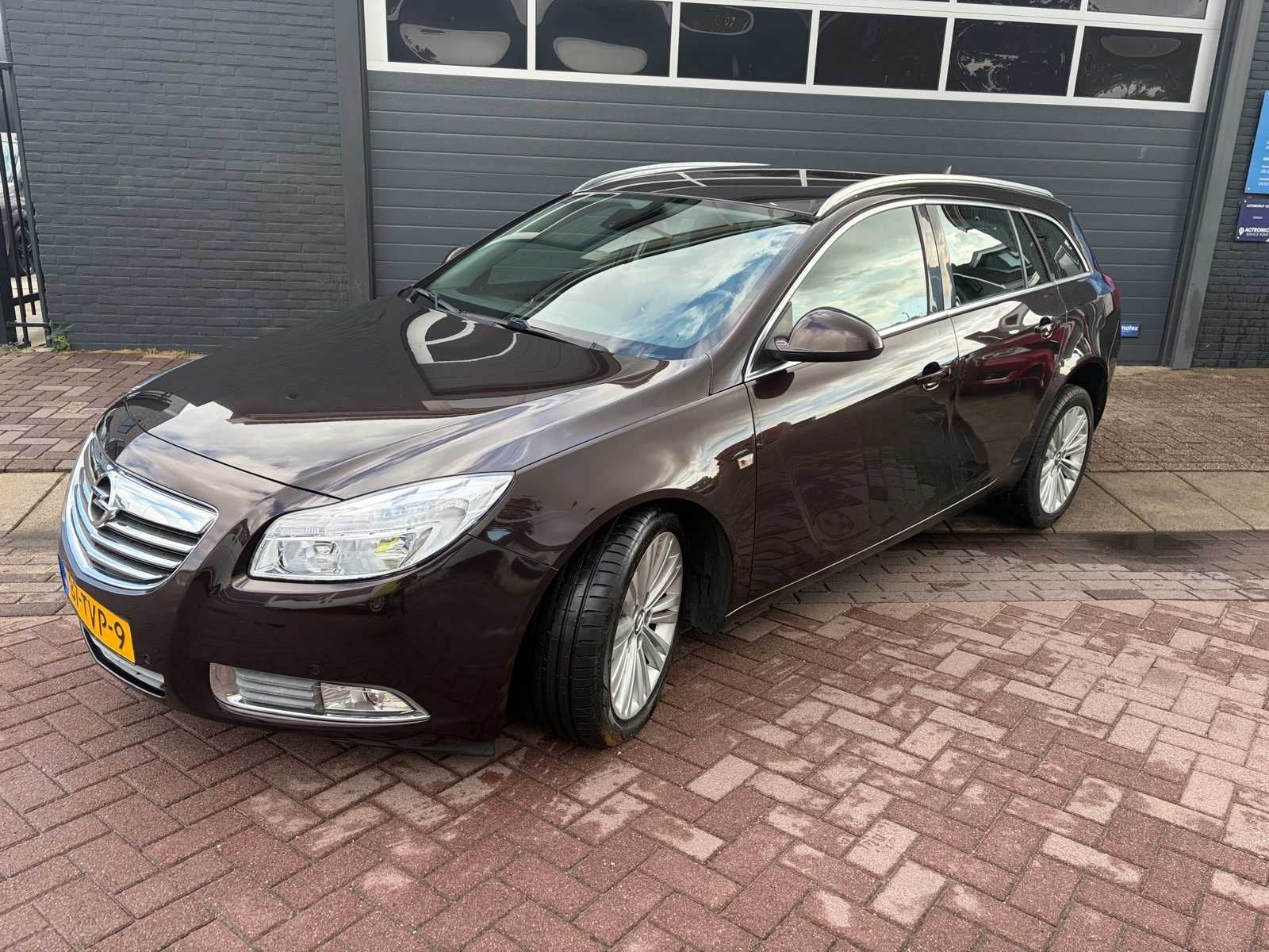 2012 Opel Insignia Sports Tourer 1.4 T EcoF. Bns Ed Personen, Auto's, Opel, Euro 5, Gebruikt, 4 cilinders, Bruin