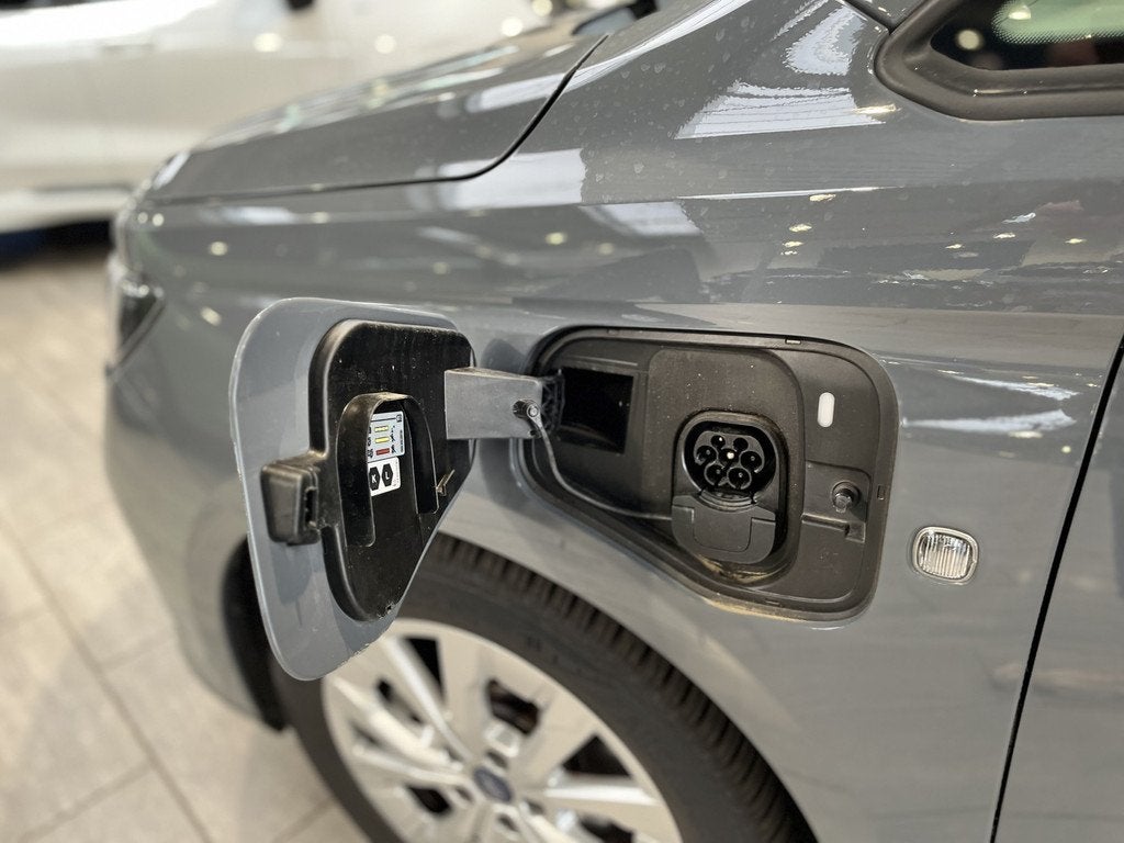 Ford Tourneo Connect 1.5 PHEV 150pk Titanium | Trekhaak | Le, Auto's, Ford, 12 maanden, Plug-in hybride, Bedrijf, Hybride Elektrisch/Benzine
