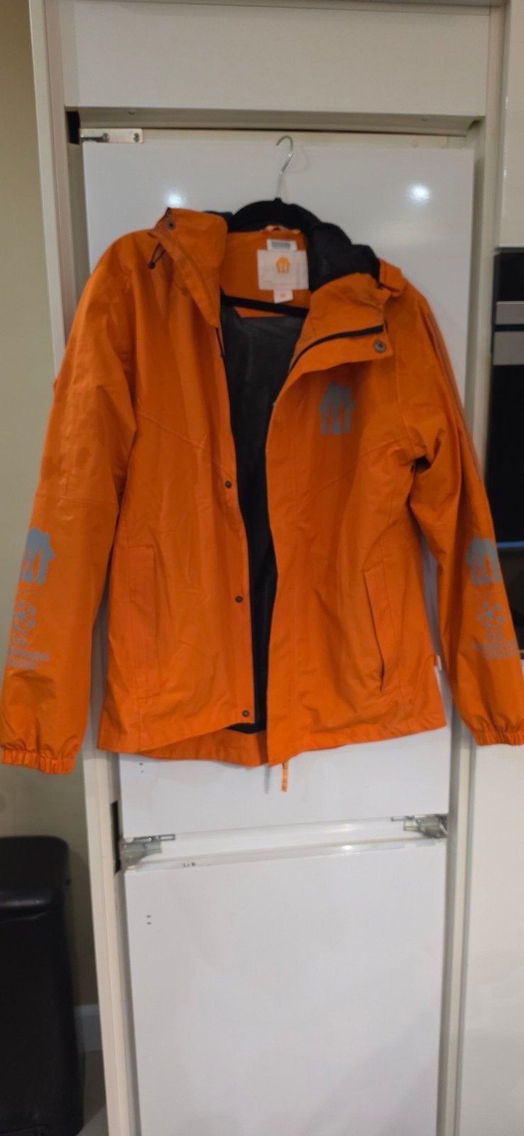 Oranje Thuisbezorgd jas, maat M, Maat 48/50 (M), Nieuw, Oranje, Ophalen of Verzenden