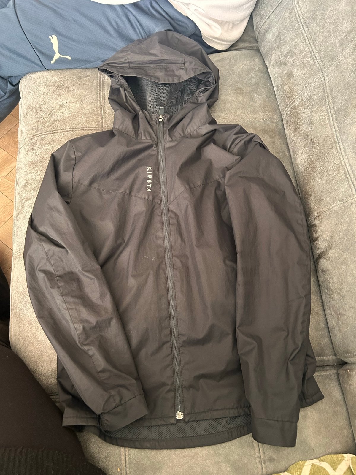 Decathlon Kipsta regenjas 10-11 jaar (141-150 cm), Ophalen, Zo goed als nieuw, Jongen of Meisje