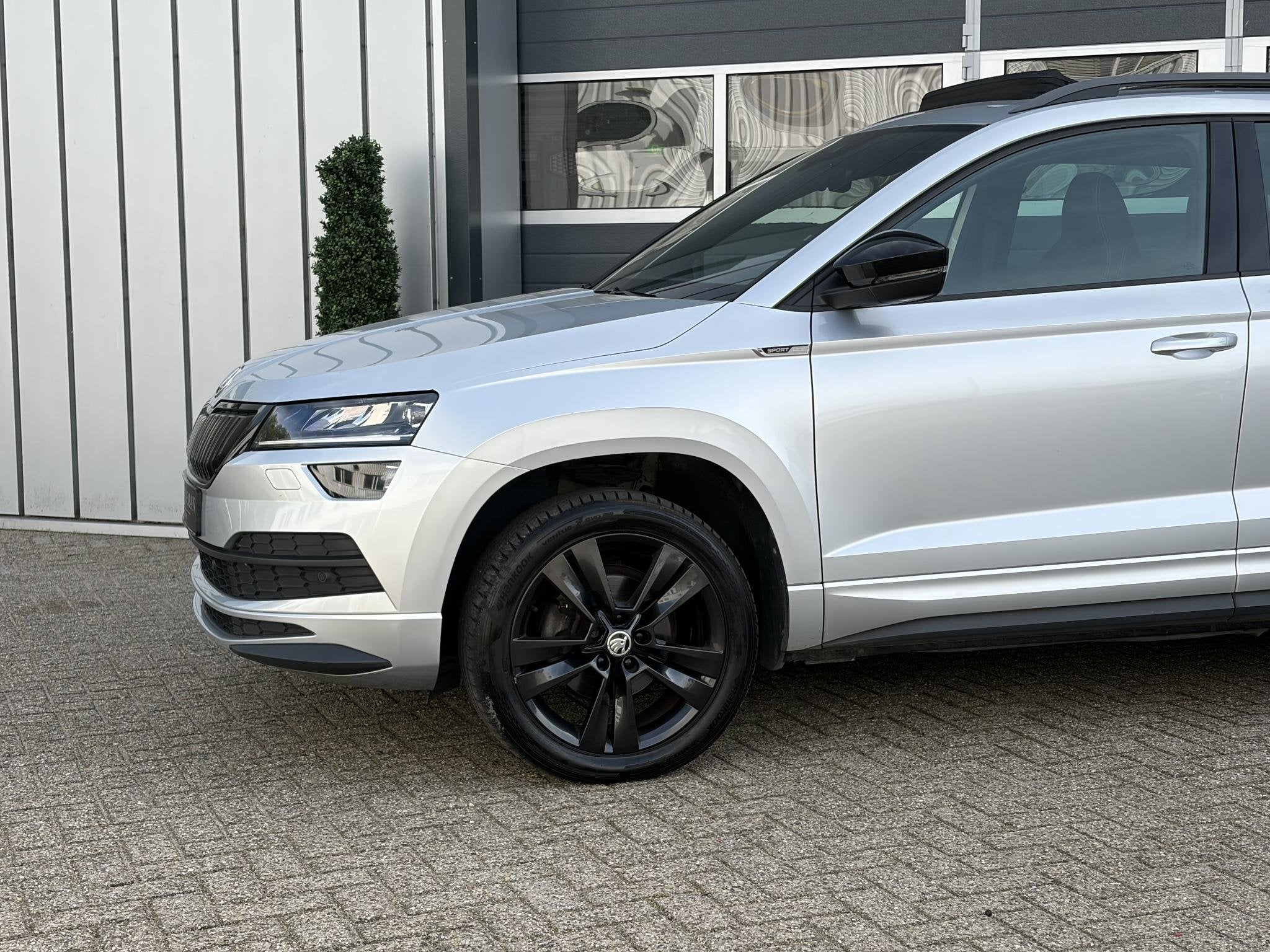 Skoda Karoq 1.5 TSI ACT Sportline | Pano | Keyless | Parkeer, Auto's, Stof, 4 cilinders, 150 pk, Karoq