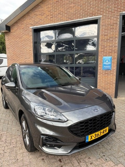 Ford Kuga 2.5 Phev E-cvt 225pk 2022 Grijs, Auto's, Zwart, Alcantara, Plug-in hybride, Dealer onderhouden