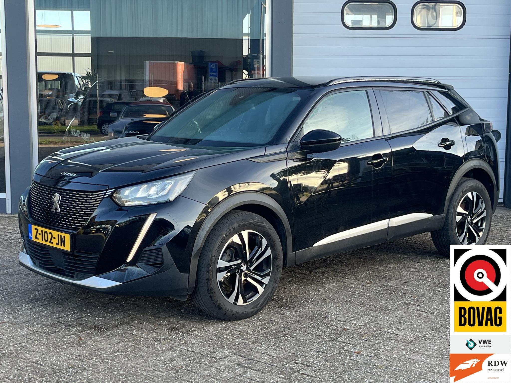 Peugeot 2008 1.2 PureTech Style, Stof, Gebruikt, Euro 6, Zwart