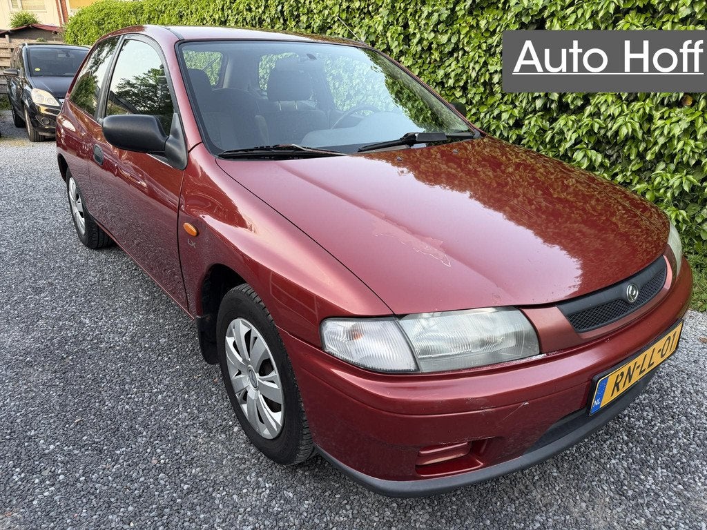 Mazda 323 1.5i P LX | Trekhaak | Radio / CD | APK tot 05-10-, Voorwielaandrijving, Stof, 4 cilinders, 400 kg