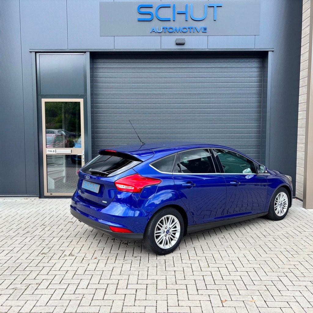 Ford Focus 125pk Titanium CLIMA | CRUISE CONTROL | HALF LEDE, Auto's, Ford, 125 pk, Gebruikt, Zwart, Blauw