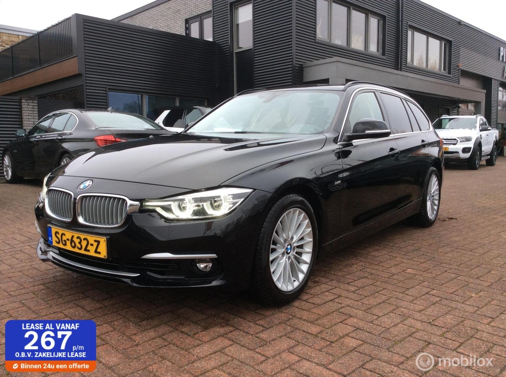 BMW 3-serie Touring 318i Luxury Edition Nav St Verw Trekh Na, Gebruikt, Euro 6, 1465 kg, Zwart