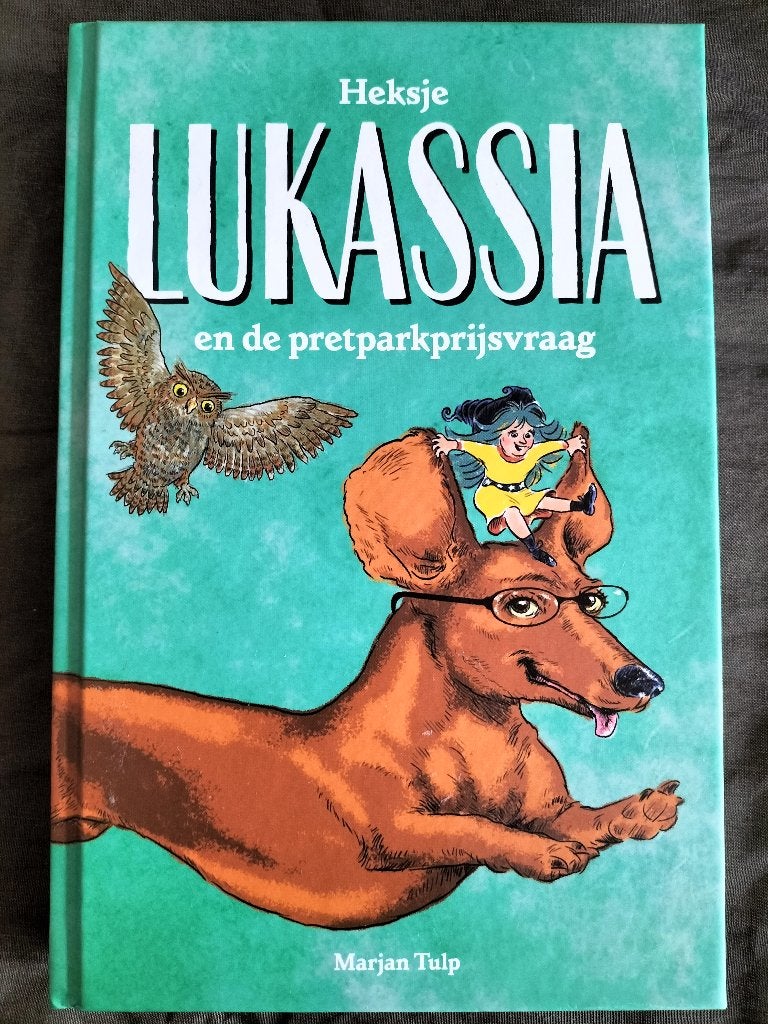 Marjan Tulp - Heksje Lukassia en de pretparkprijsvraag, Boeken, Ophalen of Verzenden, Zo goed als nieuw, Marjan Tulp, Fictie algemeen