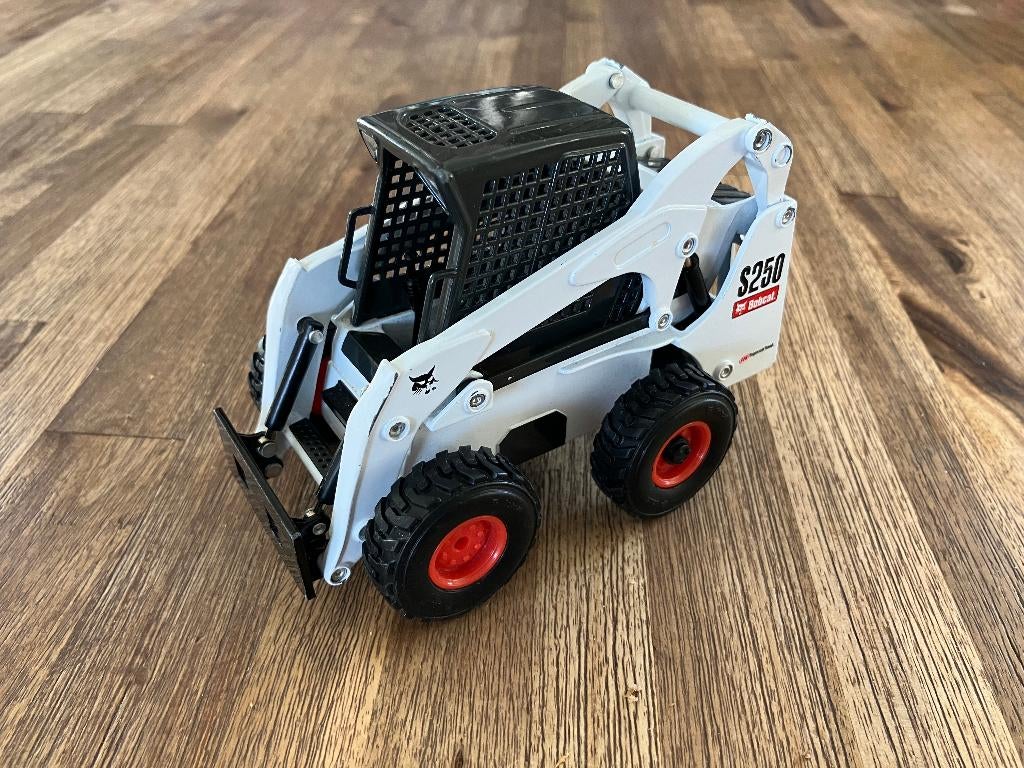 Metalen Bobcat S250 Schranklader schaalmodel 1:25, Overige merken, Gebruikt, Ophalen of Verzenden, Groter dan 1:32