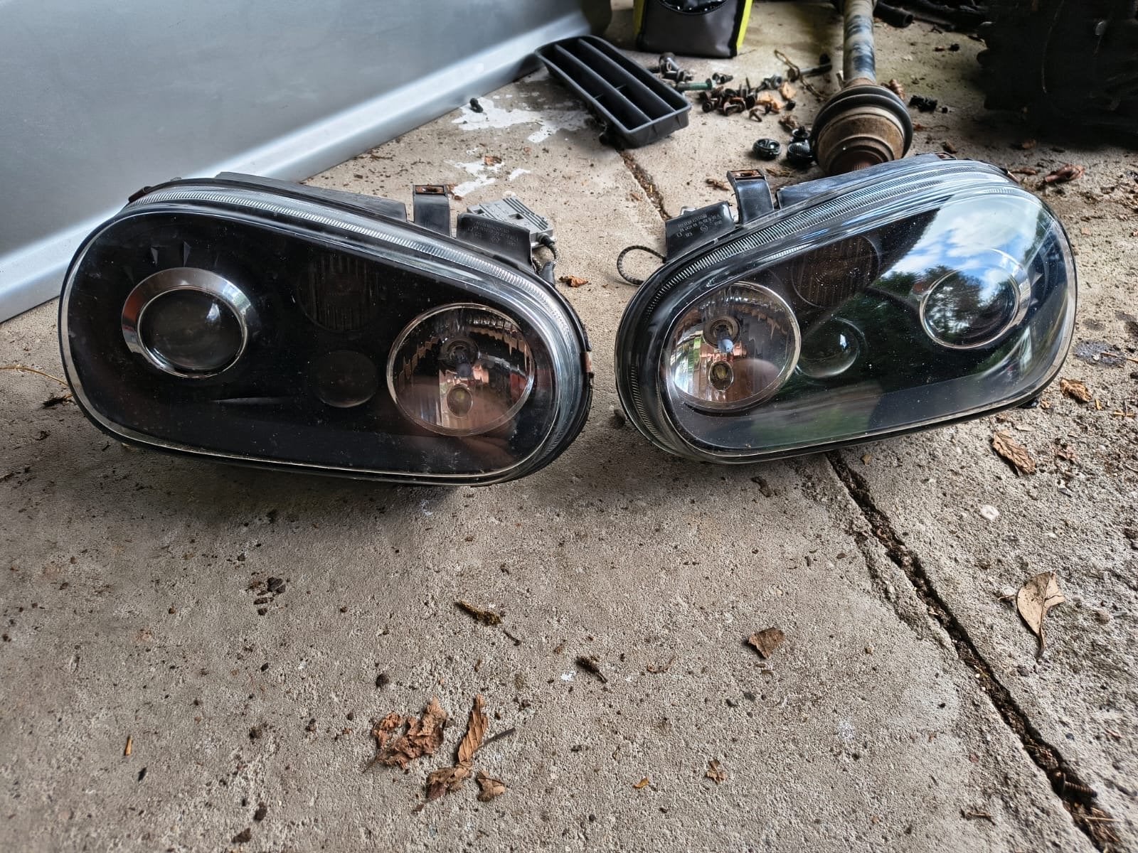 Black housing koplampen golf 4, Ophalen, Gebruikt, Volkswagen