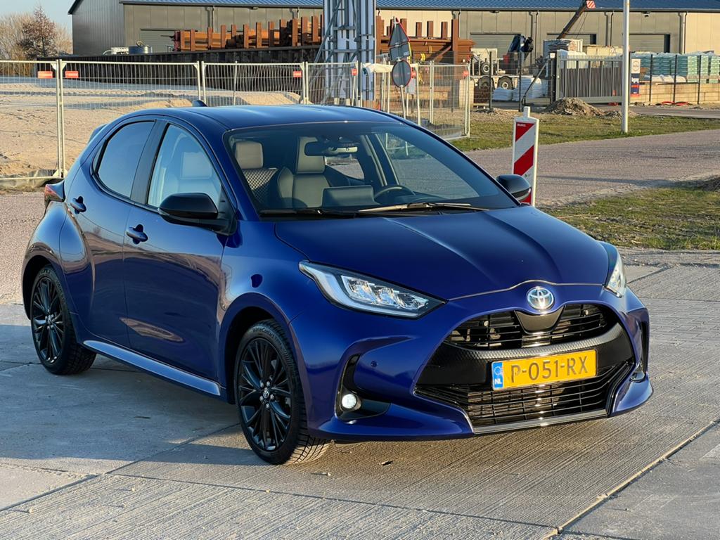 Toyota Yaris 1.5 Hybrid 116pk CVT 2022 Blauw, Auto's, 450 kg, Blauw, Lichtsensor, Yaris