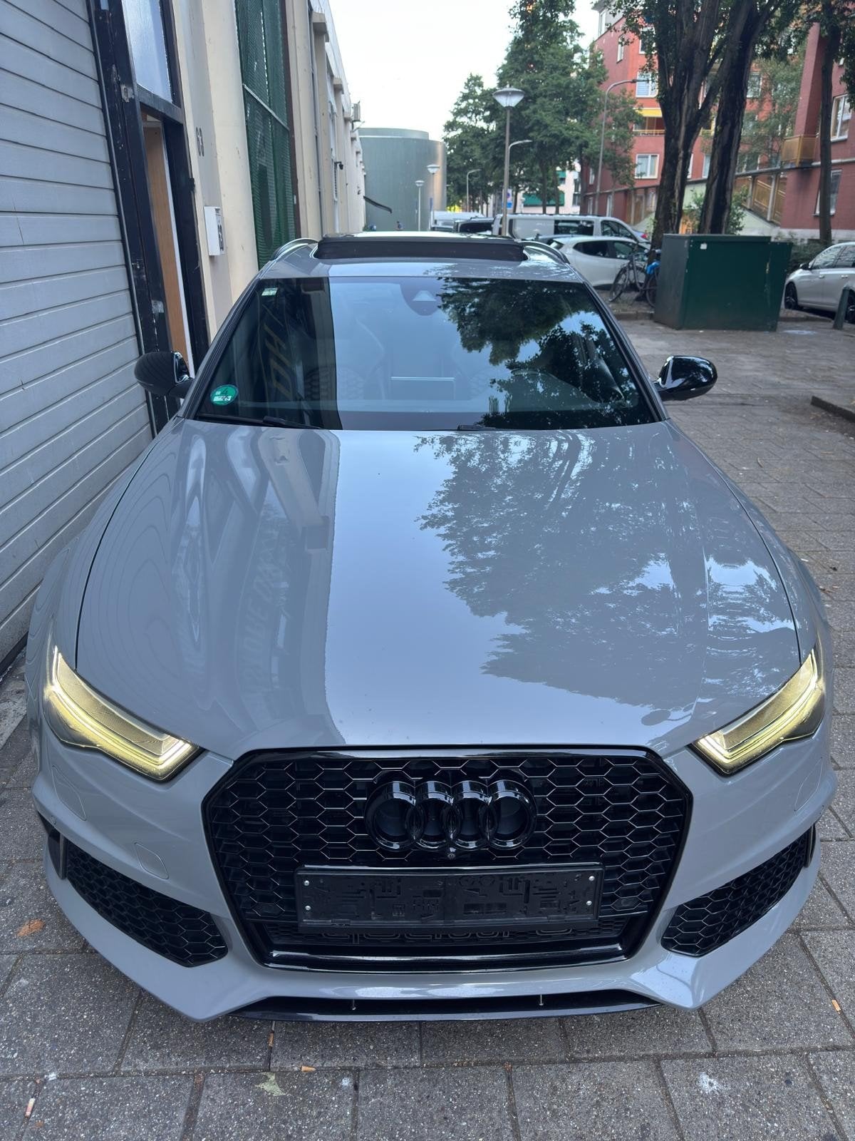 Audi RS6 4.0 Performance Quattro Avant 2016 Grijs, Auto's, Audi, RS6, Lichtsensor, 3993 cc, 606 pk