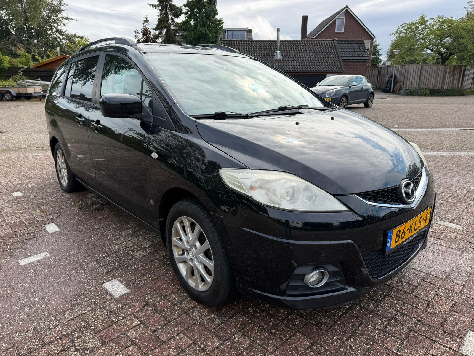 Mazda 5 2.0 2010 Zwart, Auto's, 145 pk, Zwart, 4 cilinders, 7 stoelen