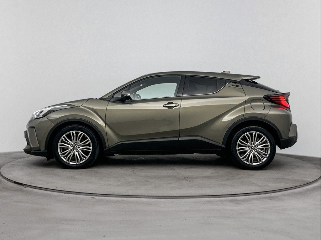 Toyota C-HR 1.8 Hybrid Executive | Dealer Onderhouden | JBL, Auto's, Toyota, 12 maanden, 4 cilinders, Leder en Stof, 122 pk