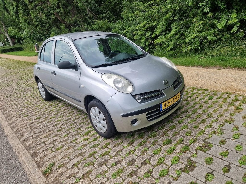 Nissan Micra 1.2 AIRCO ABS 5Deurs Grijs, Auto's, Nissan, Stof, 31 €/maand, 4 cilinders, Origineel Nederlands