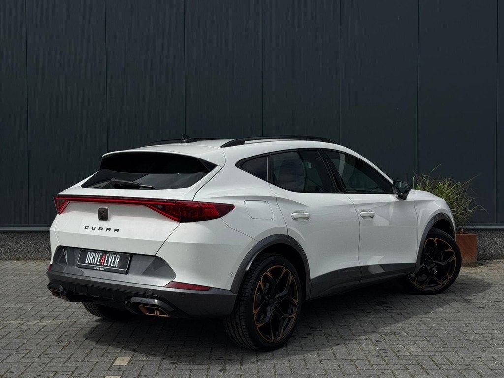CUPRA Formentor 1.4 e-Hybrid Business 9-23 204pk NAVI | CAME, Auto's, Gebruikt, Zwart, 4 cilinders, Wit