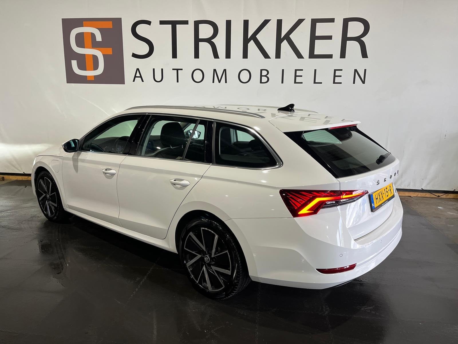 Skoda Octavia Combi 1.4 TSI iV PHEV Business Edition, Auto's, Adaptive Cruise Control, Stof, Gebruikt, 150 pk