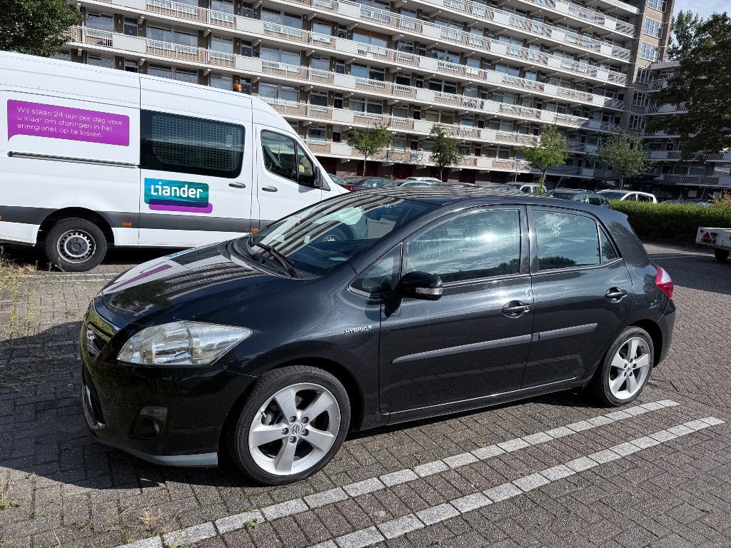Toyota Auris 1.8 Full Hybrid 5DR CVT 2011 Zwart, Auto's, Toyota, Euro 5, Zwart, 4 cilinders, Alcantara