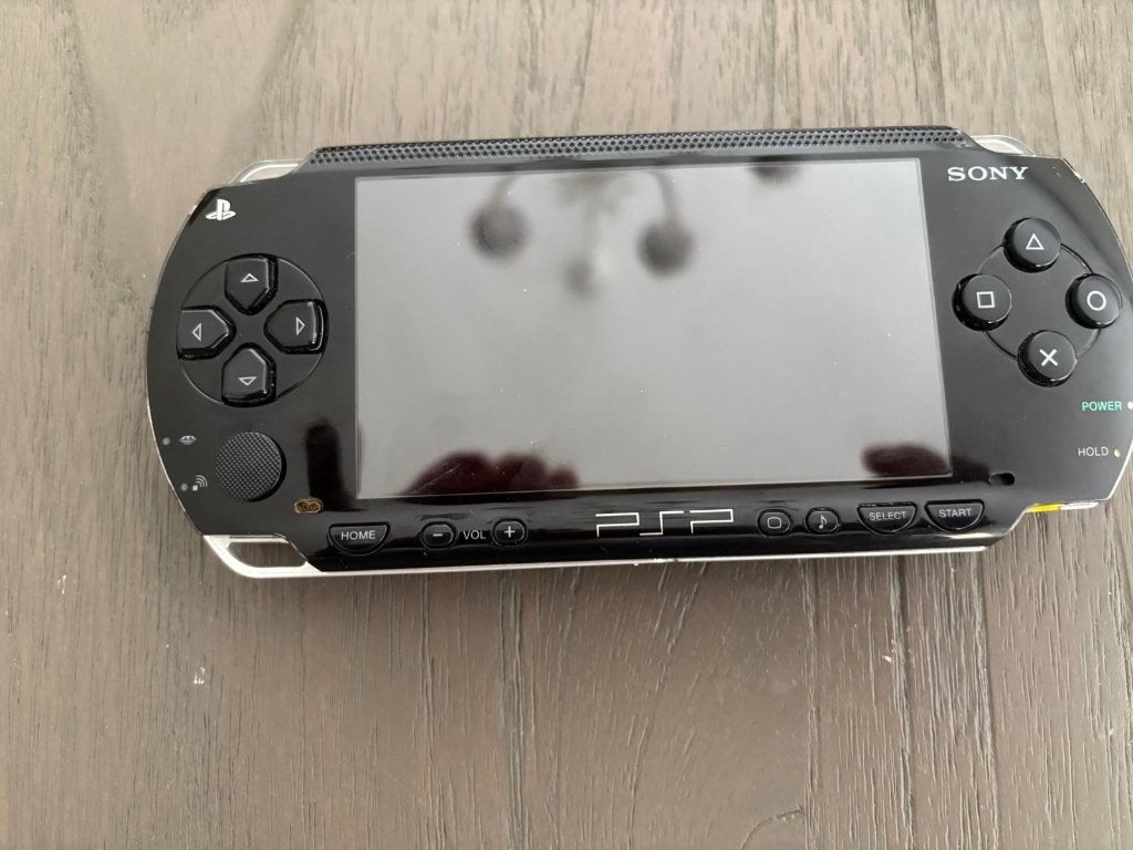 Sony PSP 1000 + oplader + 10 originele spellen, Ophalen, Zwart, PSP, Gebruikt