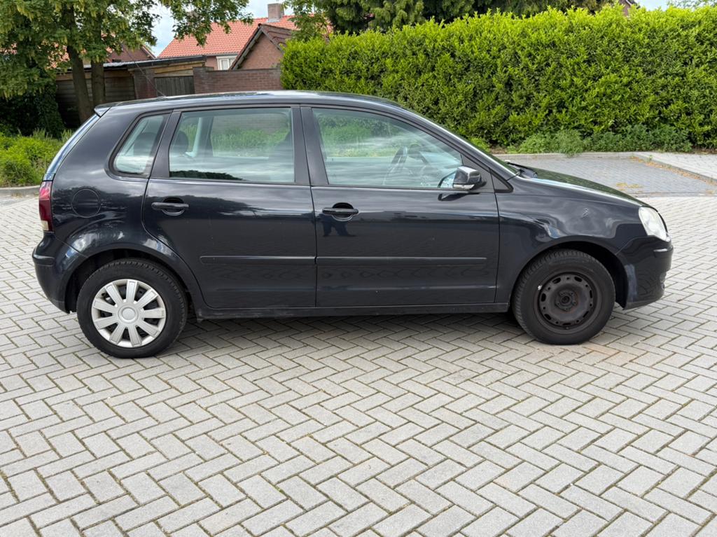 Te koop Volkswagen Polo 1.2  2006 Zwart 5 deurs APK verlopen, Voorwielaandrijving, Stof, 64 pk, 700 kg